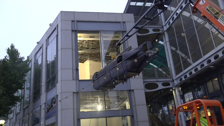 New Navy SEAL Museum Downtown Receives Giant Artifact Through Second-Story Window