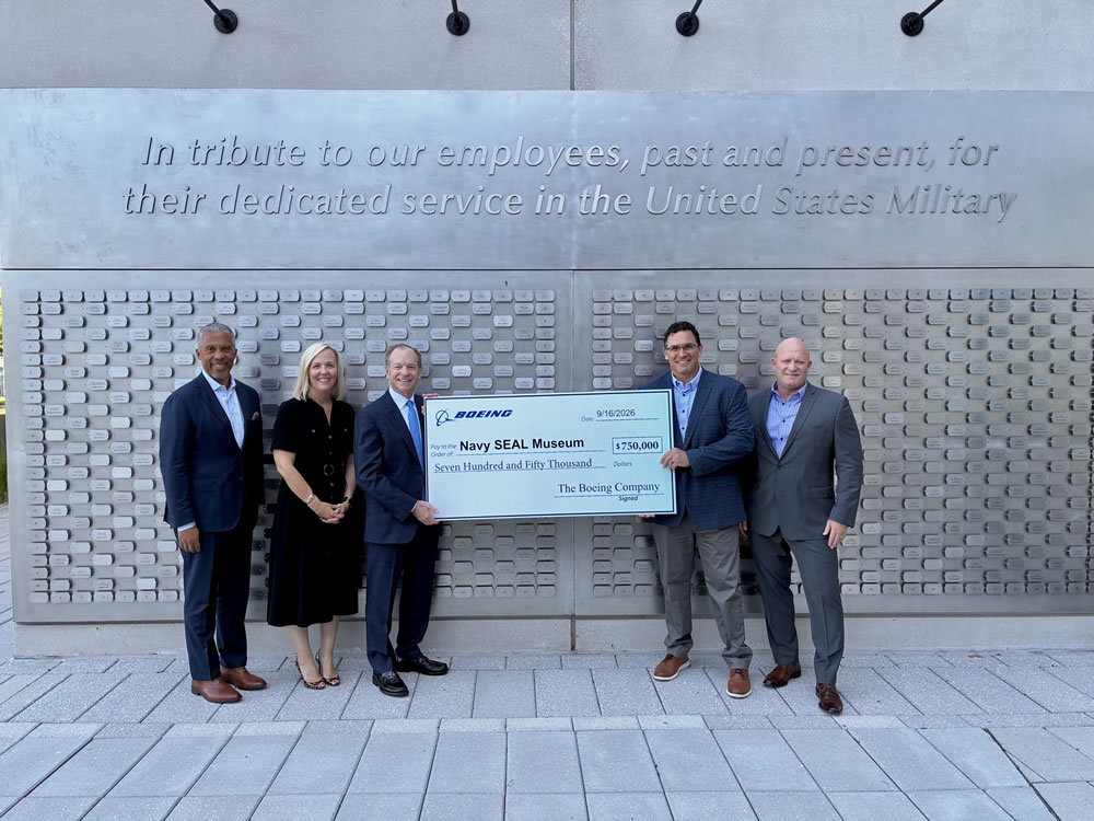 Pictured (L to R): Linwood Ham, Boeing Director of Global Engagement; Lindsay Leonard, Boeing VP of Global Engagement; Jeff Shockey, Boeing EVP of Government Operations, Global Public Policy & Corporate Strategy; ﻿Brian Drechsler Executive Director of Navy SEAL Museum San Diego; Jason Booher, Navy SEAL Museum
